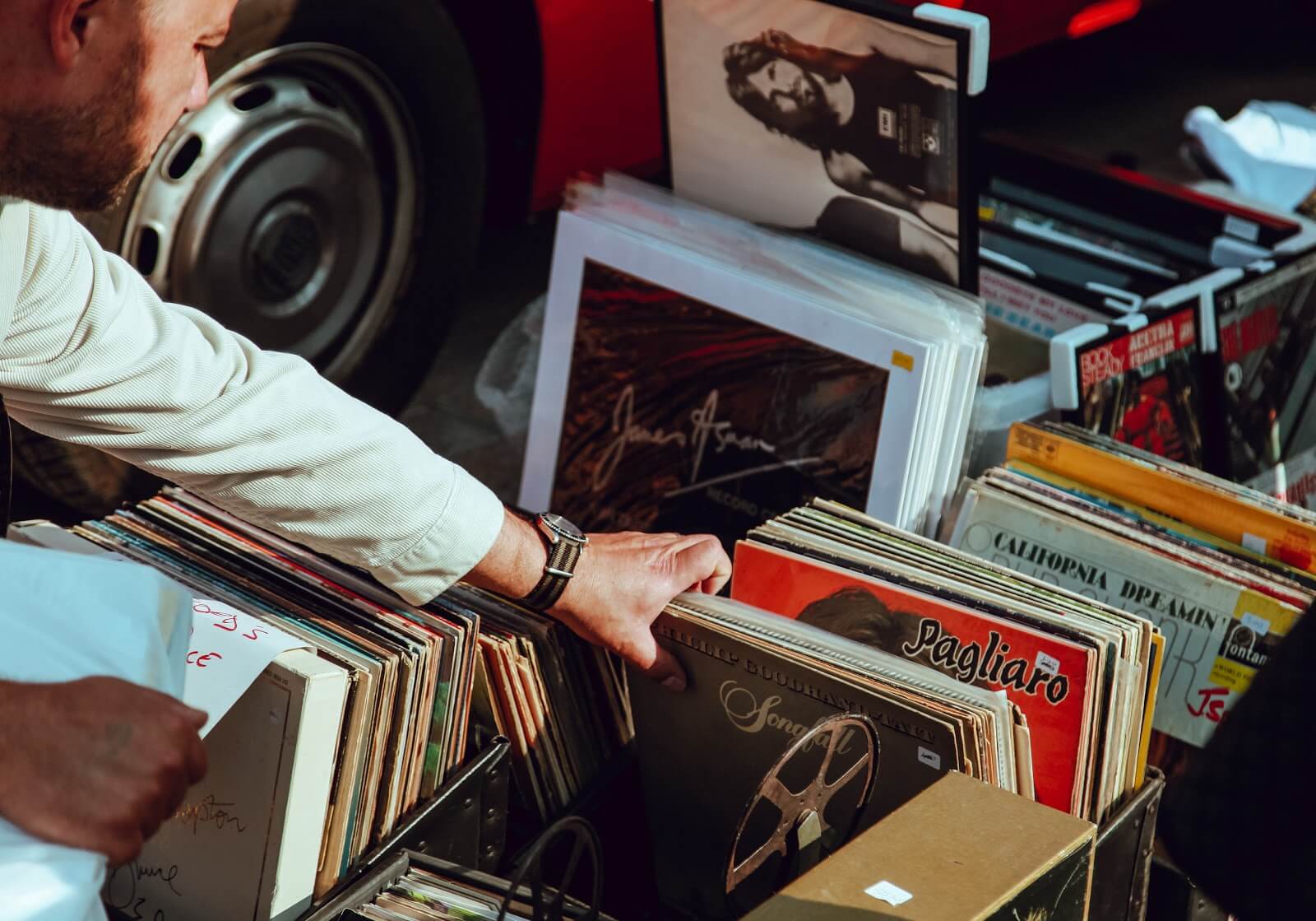 someone sorting through old records and books